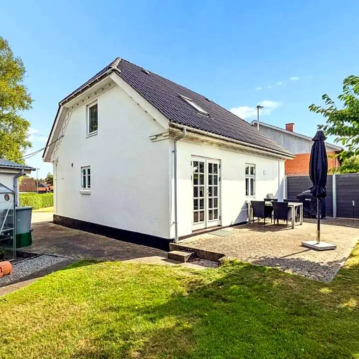 1930s home kept by one family for 50 years, with courtyard, fruit trees and greenhouse