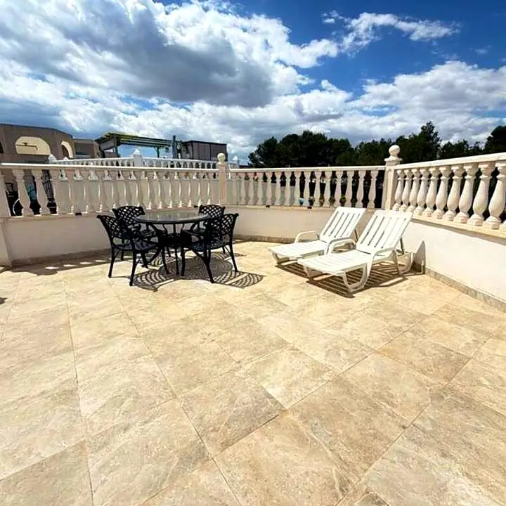 One-bedroom escape with 360-degree rooftop views towards the coast