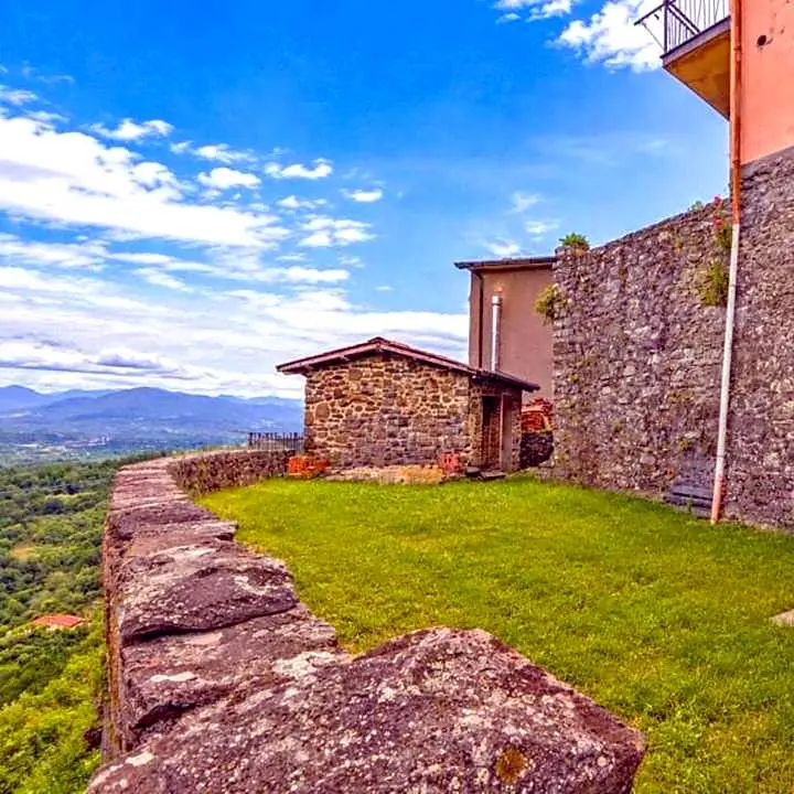 Panoramic terraces and a private garden in a historic Lunigiana village
