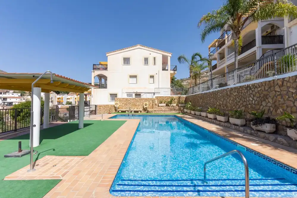 1-bedroom top-floor flat with pool in Albuñol